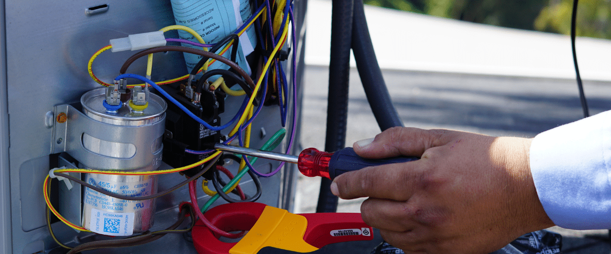 Brody Pennell technician installing a heater 