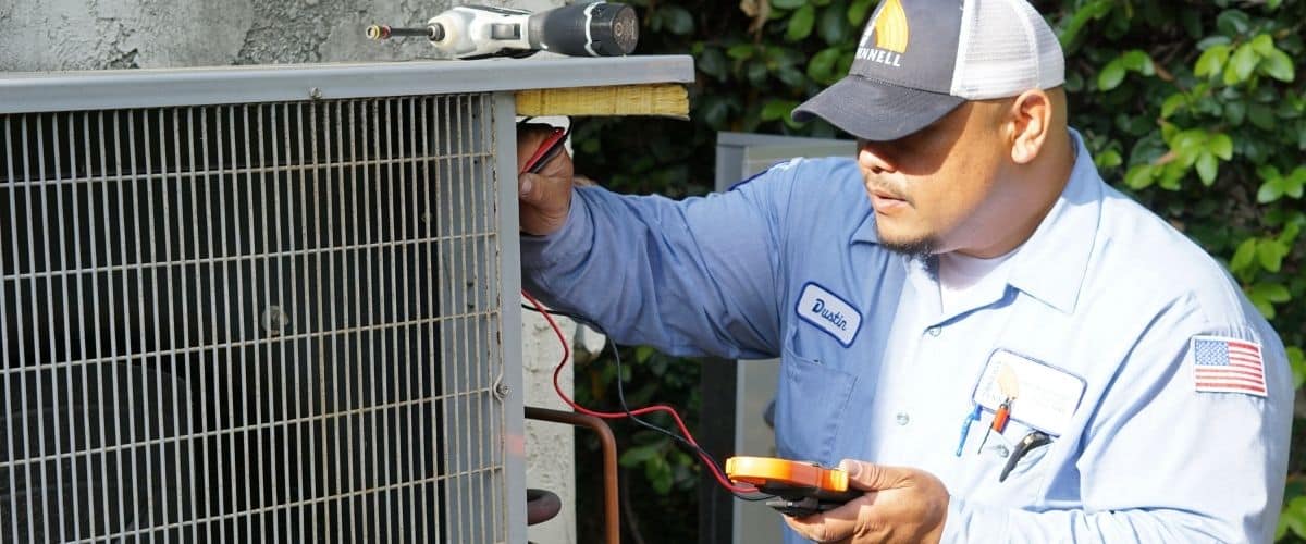 Image of a Brody Pennell technician performing a system tune-up